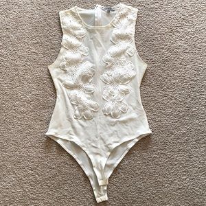 White/cream see-through bodysuit